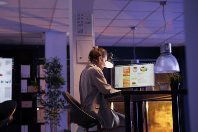 Portrait of young man working in office