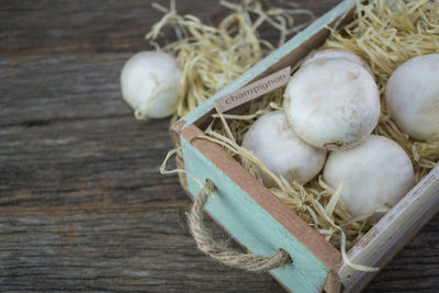 High angle view of eggs in container on table