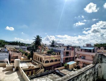 Buildings in city against sky