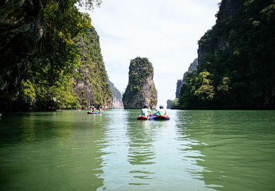 People kayaking in lake