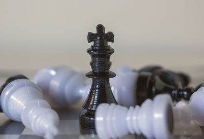 Close-up of chess board on table