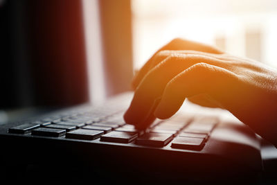 Close-up of person using mobile phone