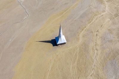 High angle view of umbrella on beach