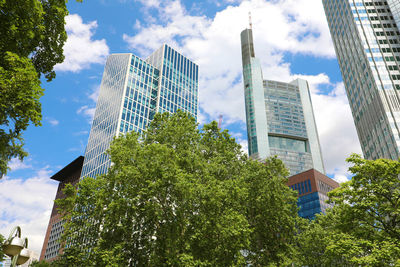 Low angle view of modern buildings against sky