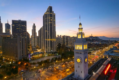 Illuminated buildings in city