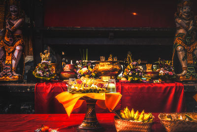 Illuminated candles in temple
