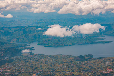 Lake burera in rwanda seen from mount muhabura in the mgahinga gorilla national park, uganda