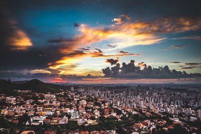 High angle shot of townscape against sky during sunset