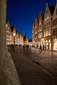 Buildings in city at night