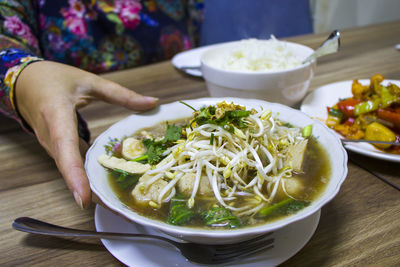 Thai chicken meatball soup in restaurant, meal