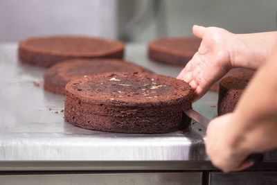 Midsection of man preparing food