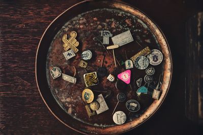 High angle view of objects in plate on wooden table