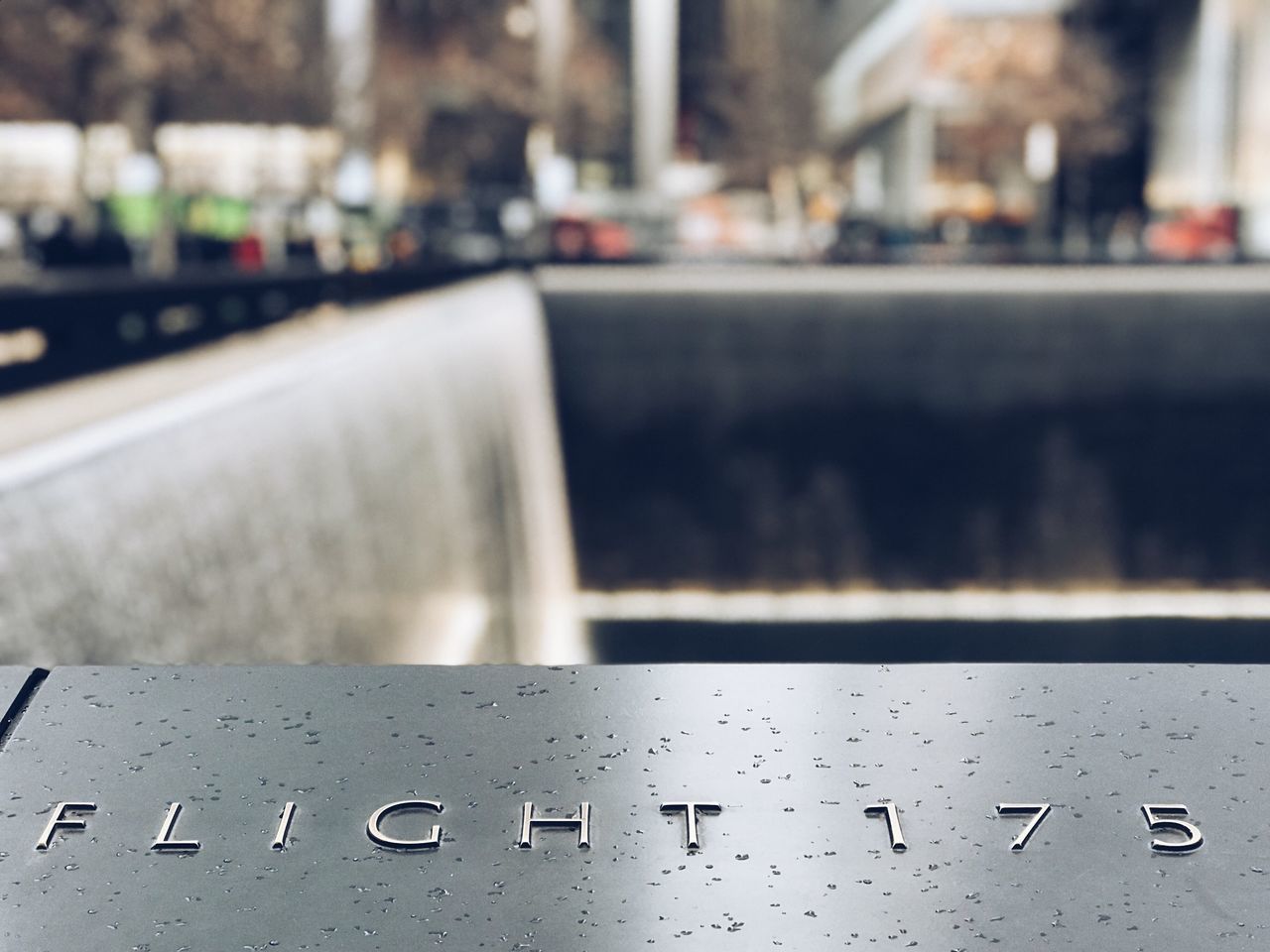 CLOSE-UP OF WATER DROPS ON CARS