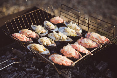 Close-up of meat on barbecue grill