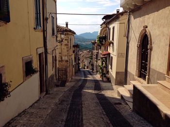 Narrow alley with buildings in background