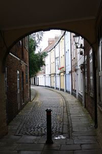 Empty road amidst buildings in city. prince street kingston upon hull 