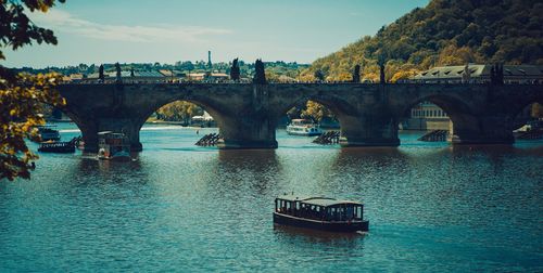 Bridge over river against sky