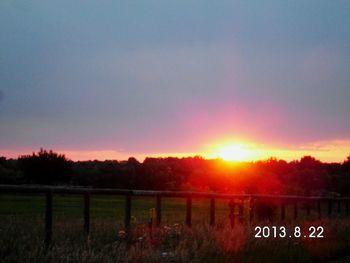 Scenic view of landscape at sunset