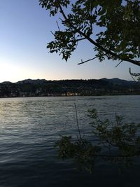Scenic view of lake with mountains in background