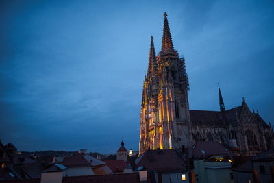 Low angle view of building against sky at dusk