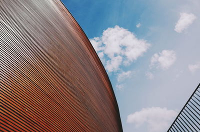 Low angle view of church wall against sky