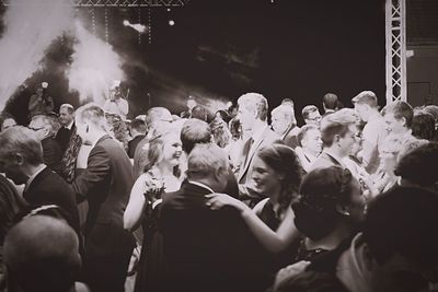 People dancing on street at night