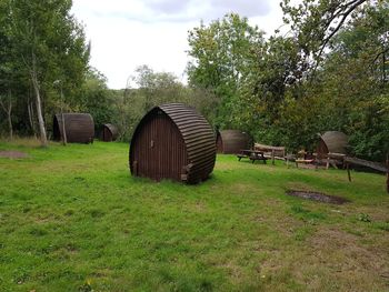 Tractor on field against sky