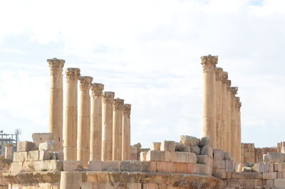 View of old ruin building against cloudy sky