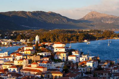 High angle view of townscape by sea