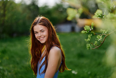 Portrait of young woman looking away