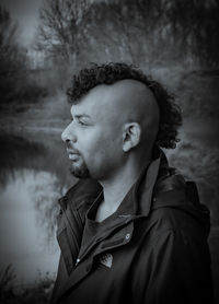 Portrait of young man looking away