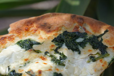 Close-up of pizza served in plate