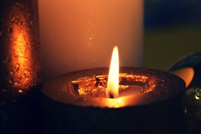 Close-up of burning candle