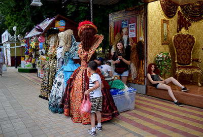 People at market stall