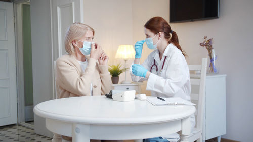 Dentist examining chemical in laboratory