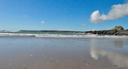 Scenic view of beach against sky
