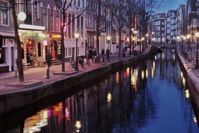 Reflection of illuminated buildings in water