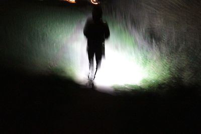 Full length of woman standing in pond