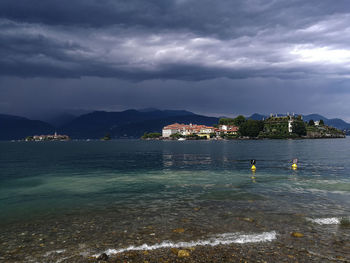 Scenic view of sea against cloudy sky