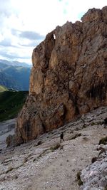 Rock formation on land against sky