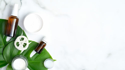 High angle view of bottles on table