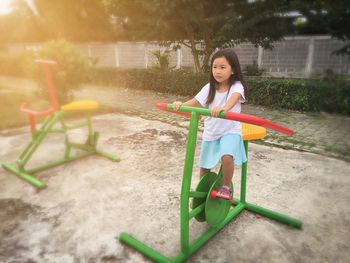 Girl playing in playground