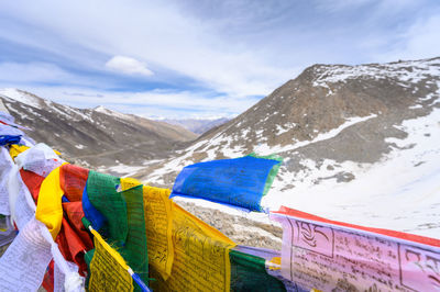 Scenic view of snowcapped mountains against sky