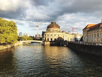 River amidst buildings in city