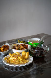 Assorted malay dishes served on the table. staple menu for lunch and dinner in malaysia.