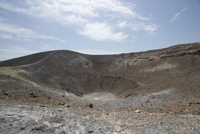 Scenic view of volcano crater against sky