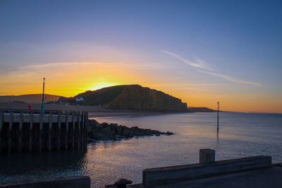 Scenic view of sea against sky during sunsunrise west bay dorset uk 