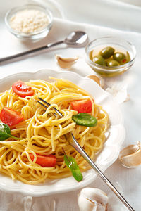 Close-up of noodles served on plate