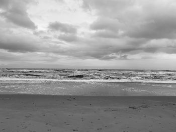 Scenic view of beach against sky