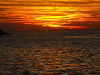 Dramatic sky over sea during sunset